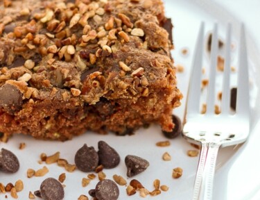 A slice of Picnic Cake on white plate.