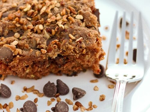 A slice of Picnic Cake on white plate.