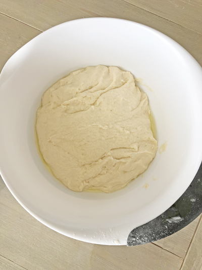 unrisen dough in a large bowl