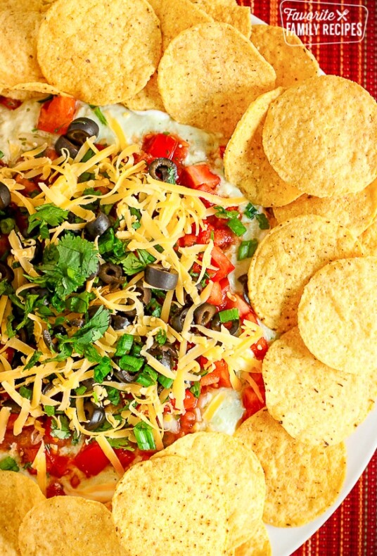 9 Layer Bean Dip Surrounded By Tortilla Chips