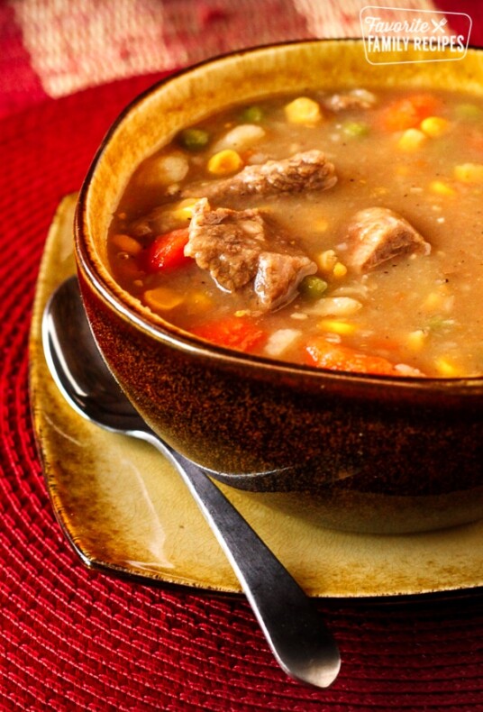 Hearty Beef Stew in a Bowl with a spoon on the side.