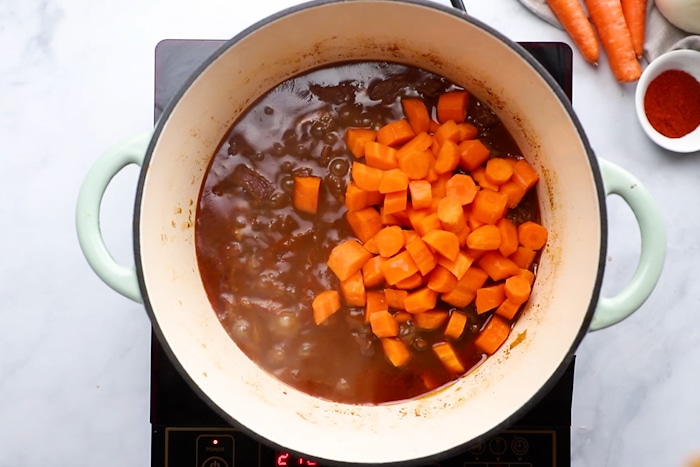 Carrots added Thick and Beefy Danish Goulash in a large pot.