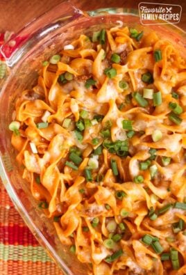 Above view of Cheesy Enchilada Casserole in a glass pan.