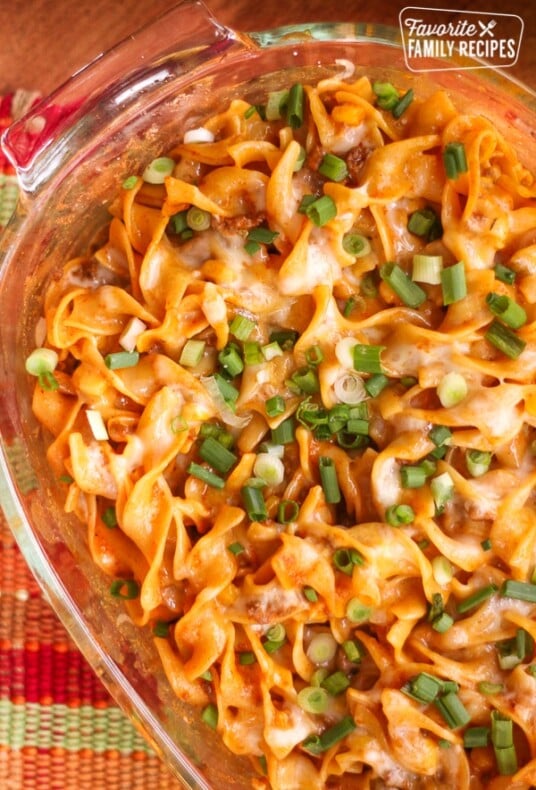 Above view of Cheesy Enchilada Casserole in a glass pan.