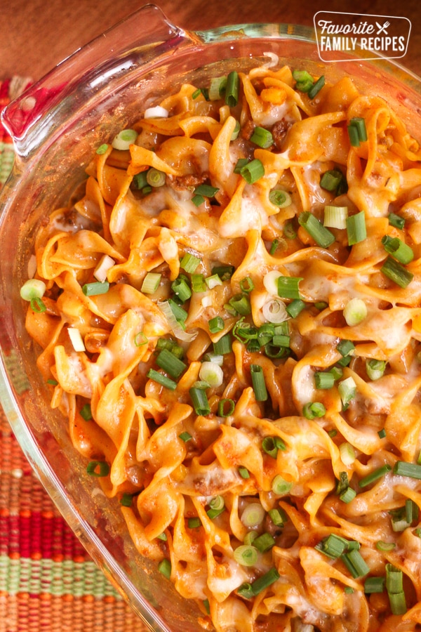 Above view of Cheesy Enchilada Casserole in a glass pan.