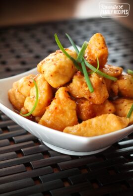 Crock Pot General Tso Chicken in a white bowl.