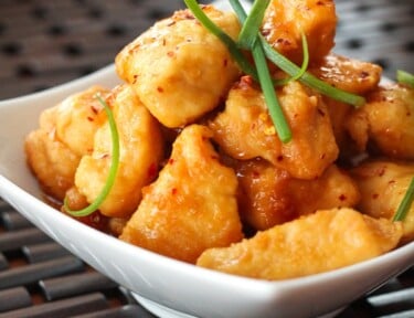 Crock Pot General Tso Chicken in a white bowl.