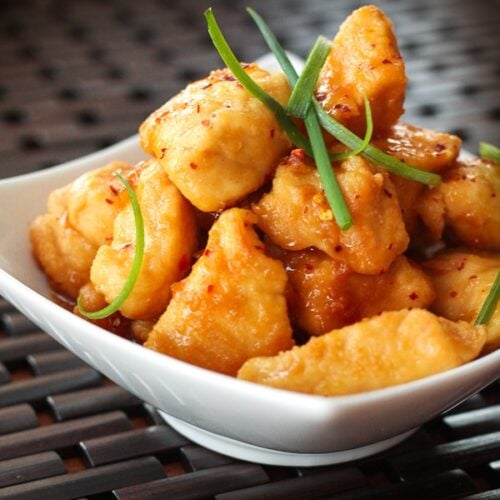 Crock Pot General Tso Chicken in a white bowl.