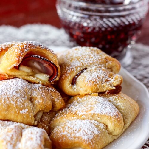 Easy Monte Cristos on a plate with a side of raspberry preserves