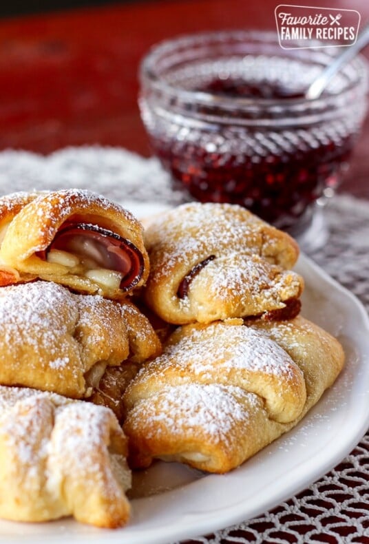 Easy Monte Cristos on a plate with a side of raspberry preserves