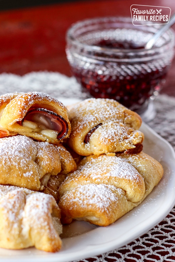 Easy Monte Cristos on a plate with a side of raspberry preserves
