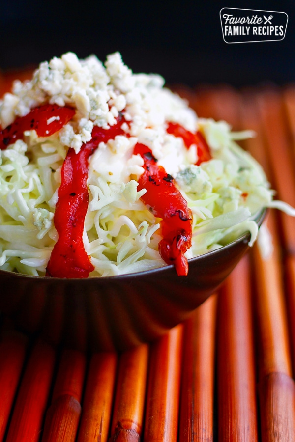 Red Pepper Coleslaw in a black bowl.