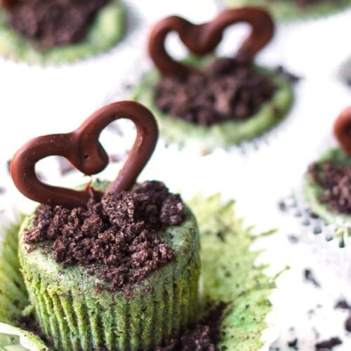 Mini Grasshopper Cheesecakes topped with chocolate hearts.