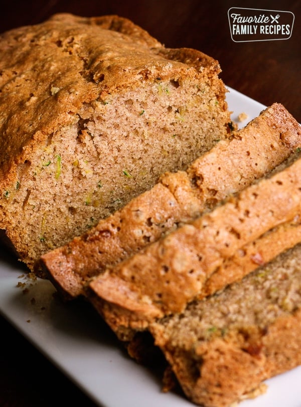 Zucchini Bread Sliced on a white tray.