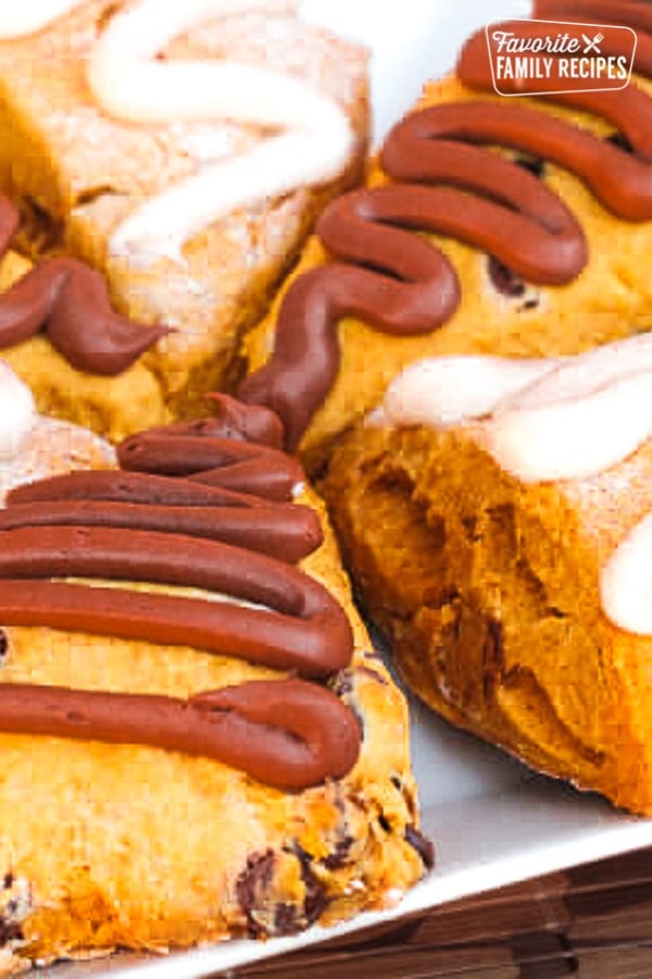 Pumpkin Scones, with chocolate cream cheese frosting will become one of your fall favorites this year! Sweet and spicy pumpkin scones pair perfectly with sweet icing. Delicious!