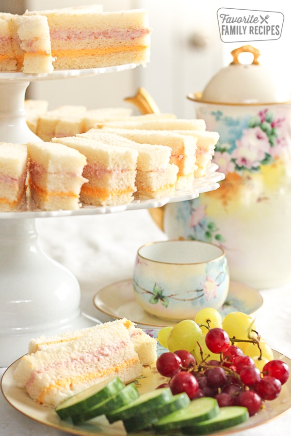 Ribbon Finger Sandwiches on a cake platter. 