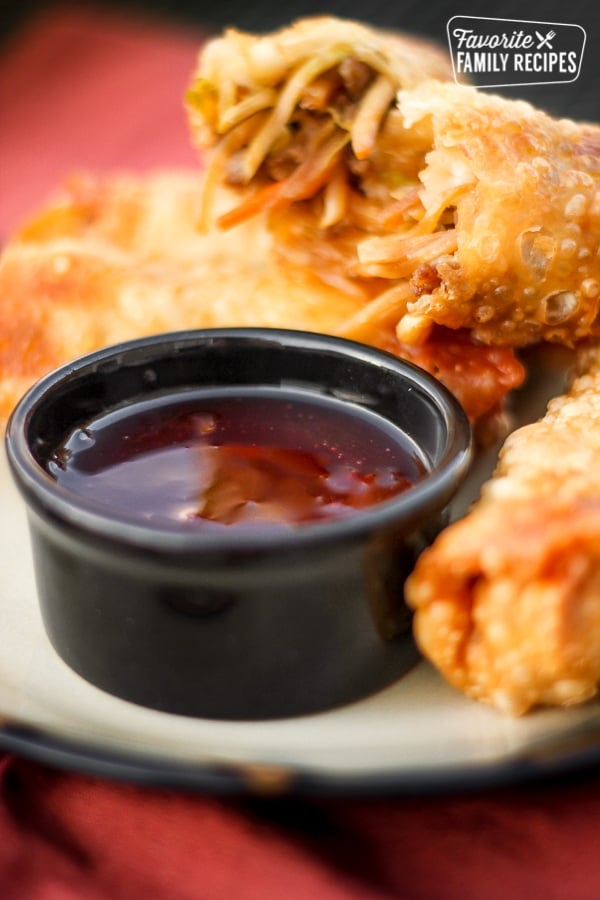 Sausage Egg Rolls with Sweet and Sour Sauce.