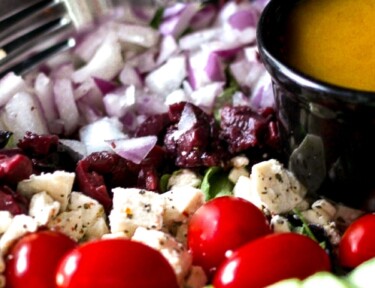 Greek Side Salad with Greek Dressing in a Bowl