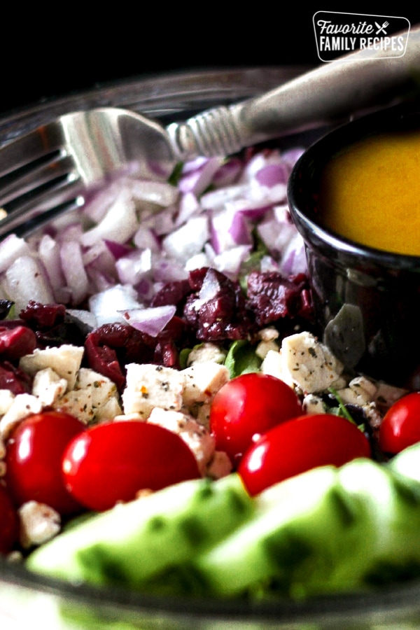Greek Side Salad with Greek Dressing in a Bowl.