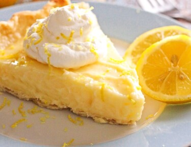 Slice of Sour Cream Lemon Pie on a plate