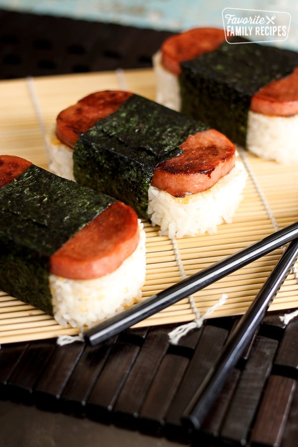 3 musubi parcels with chop sticks