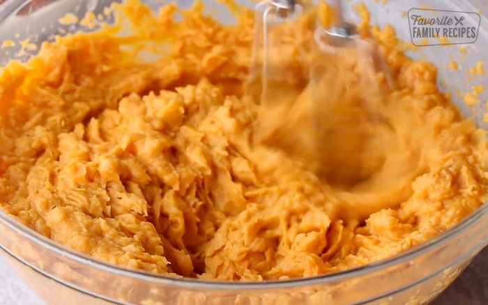 Mixing sweet potatoes for casserole