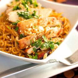 Sweet and Spicy Noodles with Chicken in a Bowl