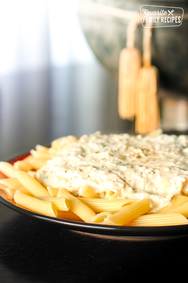 Crockpot zesty Italian dressing chicken served on a plate. 