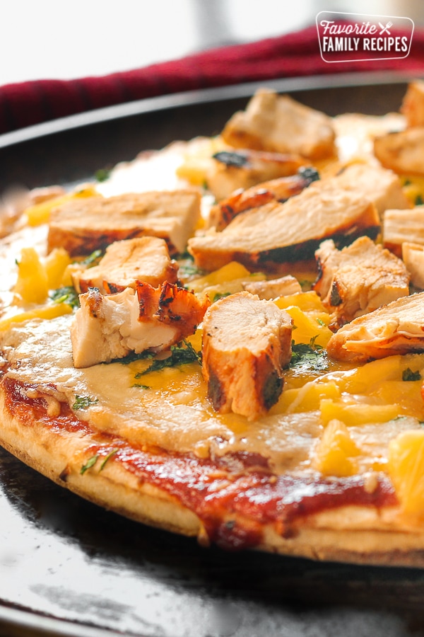 BBQ Cilantro Chicken Pizza on a pan.