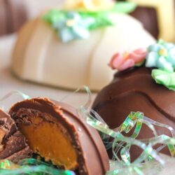 Peanut Butter Easter Eggs topped with frosting flowers