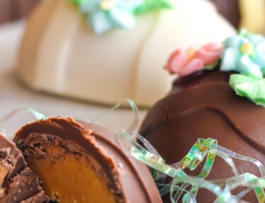 Peanut Butter Easter Eggs topped with frosting flowers