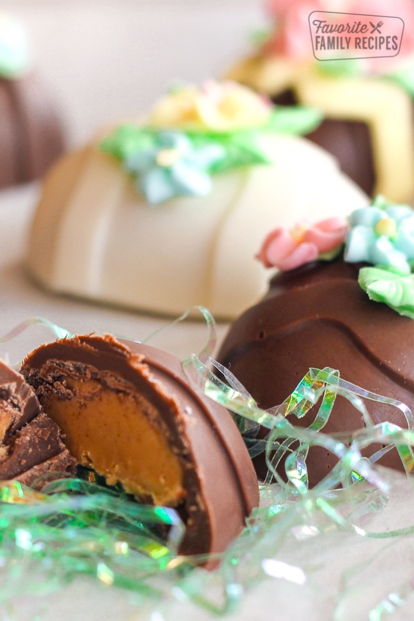 Peanut Butter Easter Eggs topped with frosting flowers 