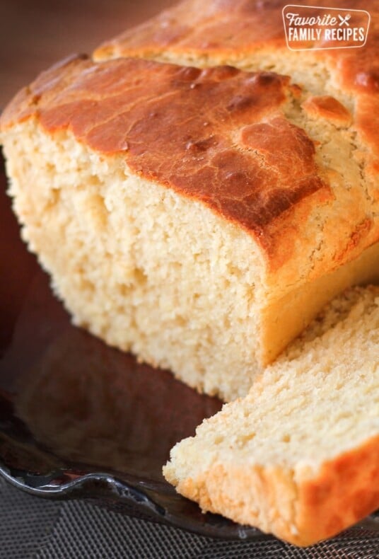 Sally Lunn bread with a slice cut off the end.