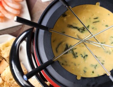 Melting Pot's Spinach Artichoke Fondue in a fondue pot