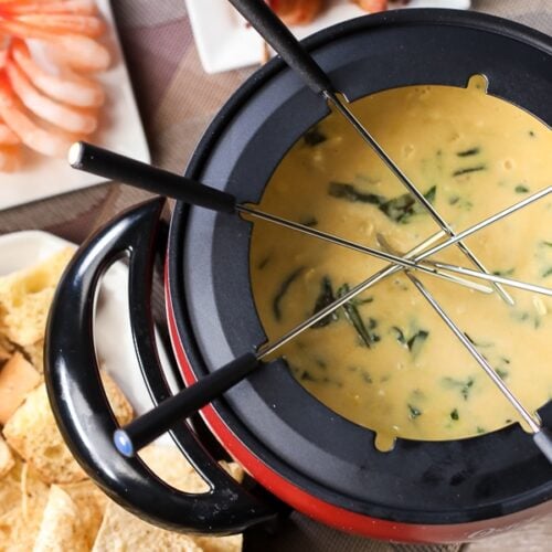 Melting Pot's Spinach Artichoke Fondue in a fondue pot