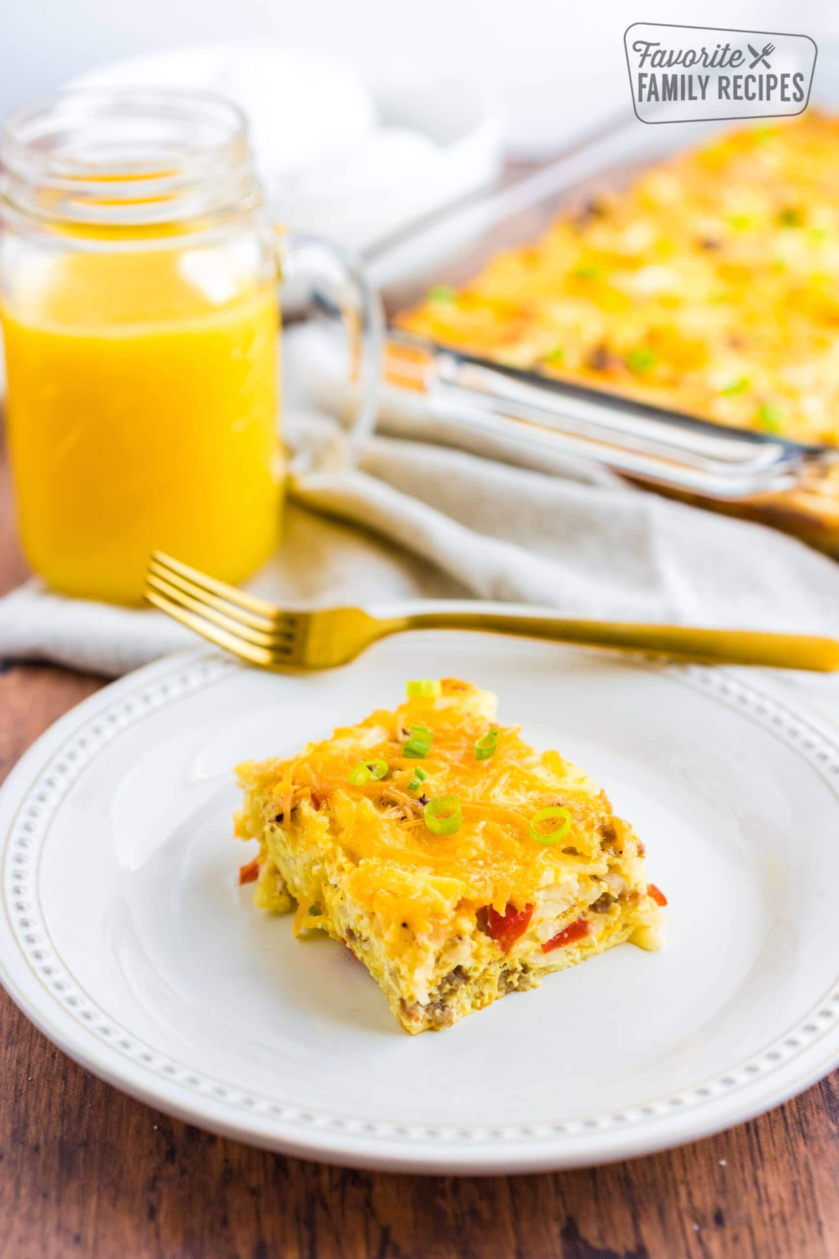 Breakfast Egg Casserole on a plate made with eggs, cheese, sausage, and peppers