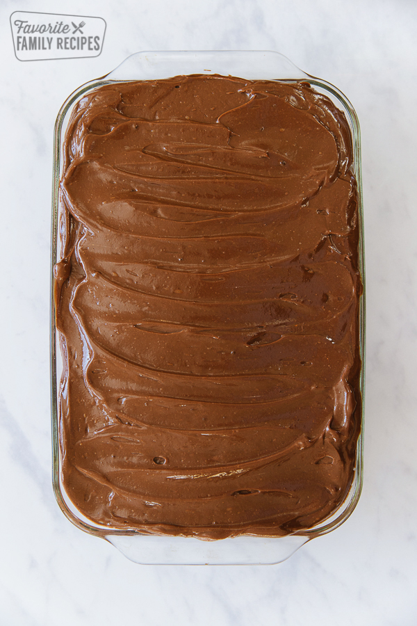 Chocolate Cherry Cake with chocolate pudding frosting spread on top