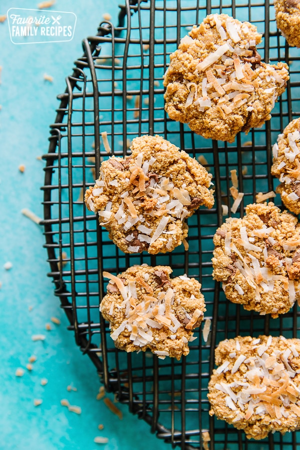 Graham Cracker Cookies with Coconut on a round cooling rack with a teal background