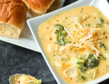 Broccoli Cheese Soup with two rolls on the side