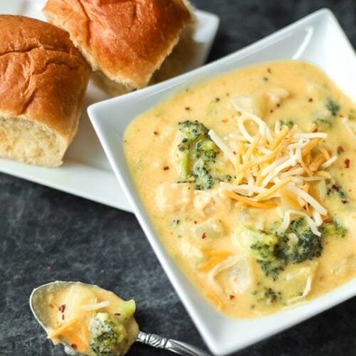 Broccoli Cheese Soup with two rolls on the side