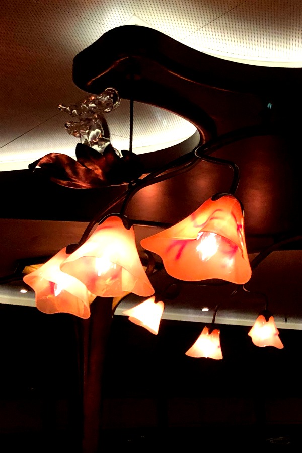 A hidden glass Remy figure in the chandelier at the Remy Restaurant 