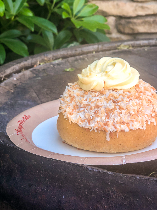 School Bread sitting on a plate outside the Kringla Bakeri Og Kafe in Epcot's World Showcase.