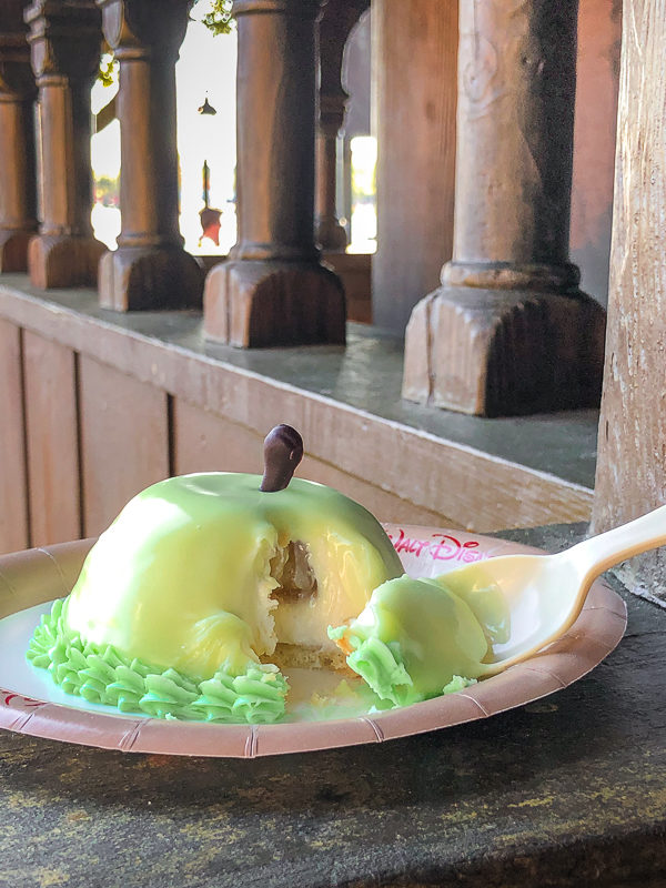Sven's Apple Cheesecake, dome of cheesecake with an apple filling and coated with a vibrant green fondant