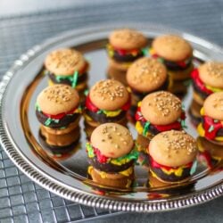 A tray of food prank mini hamburgers made from candy and cookies