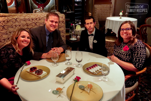 Erica, Jared, our server, and Emily at the Remy restaurant.