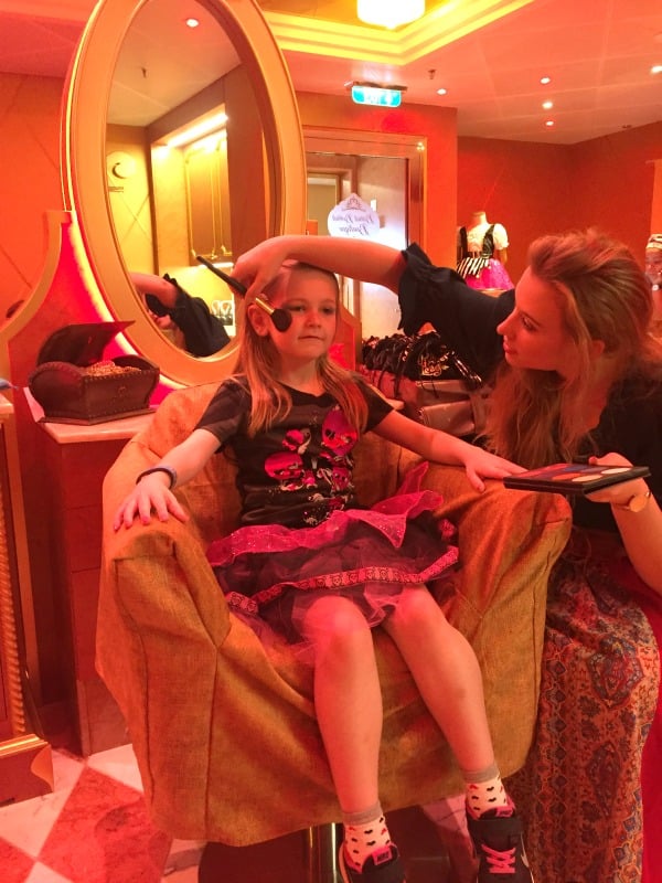 Our top "insider" tips for everything you need to know about Pirate Night on a Disney Cruise. We will tell you all the ways to make the most out of Pirate Night on your next magical Disney Cruise vacation. Piper getting her makeup done.