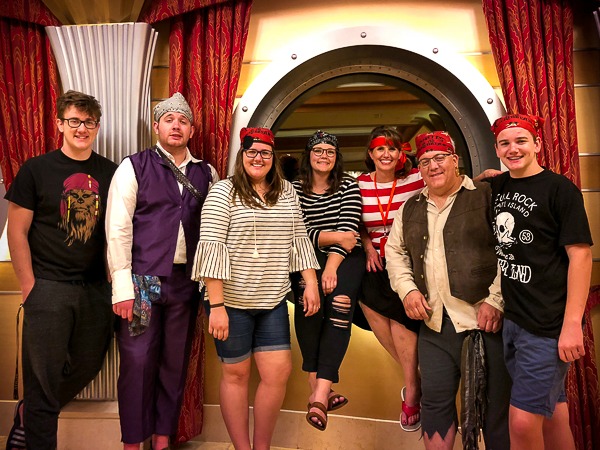 Echo and her family dressed in pirate costumes for the pirate night on the cruise. 