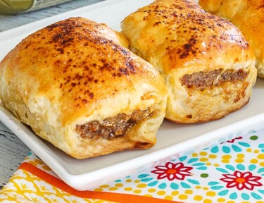 Australian sausage rolls wrapped in a pastry dough, and baked until golden brown