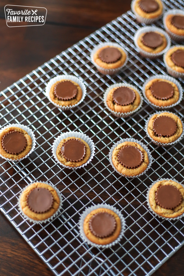 A cooling rack filled with Reese's Peanut Butter Cup Cookies