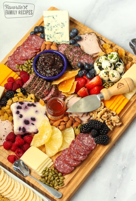 Charcuterie board with meat and cheese.